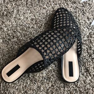 Black net slip ons